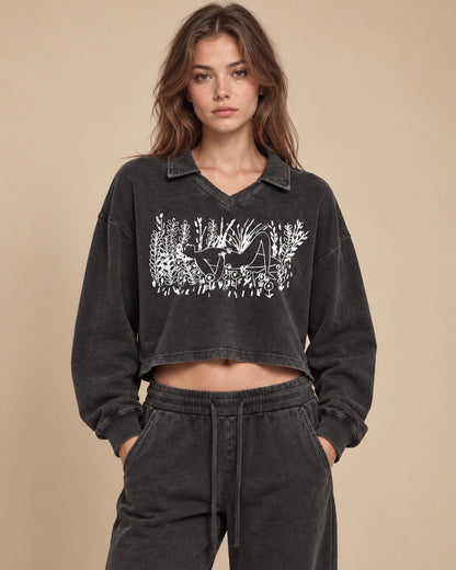 Garden Static Women's Vintage-Wash Crop Sweatshirt in Black - front lifestyle view