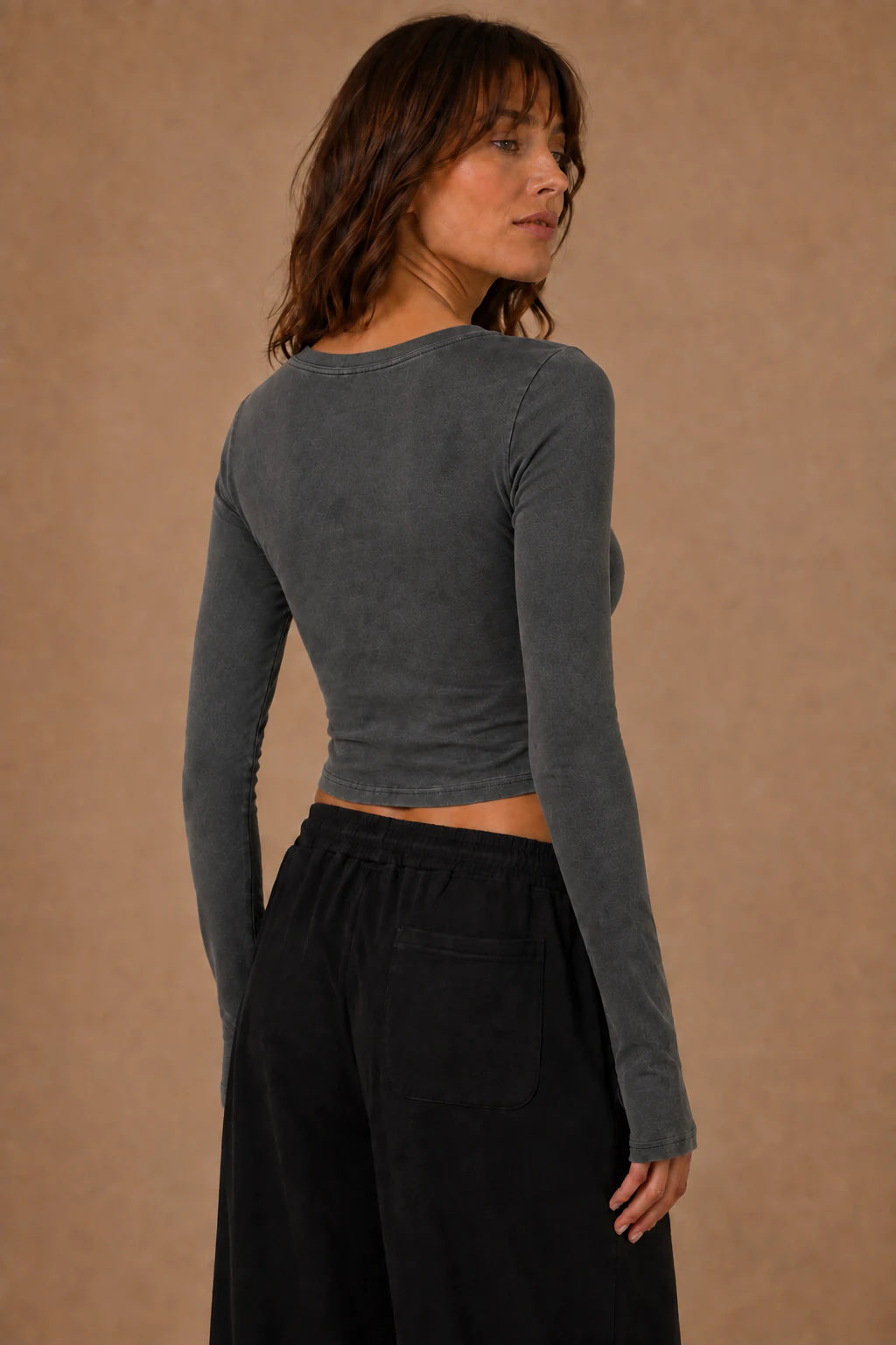 Swallow Flight Vintage-Wash Crop Top in Black - model back view