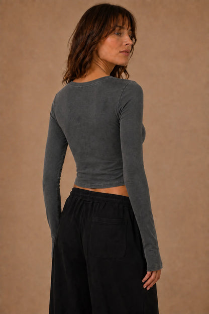Swallow Flight Vintage-Wash Crop Top in Black - model back view