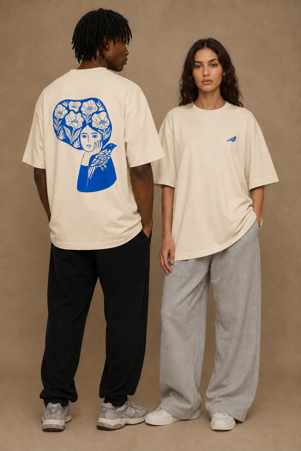 Blue Bird Reverie Oversized Unisex Tee in Mild Apricot - front and back lifestyle view