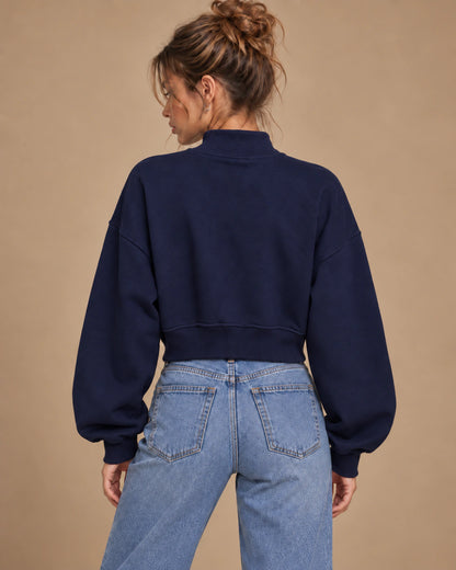 Eclipse Muse Women's Cropped Mock-Neck Sweatshirt in Navy Blue - back lifestyle view