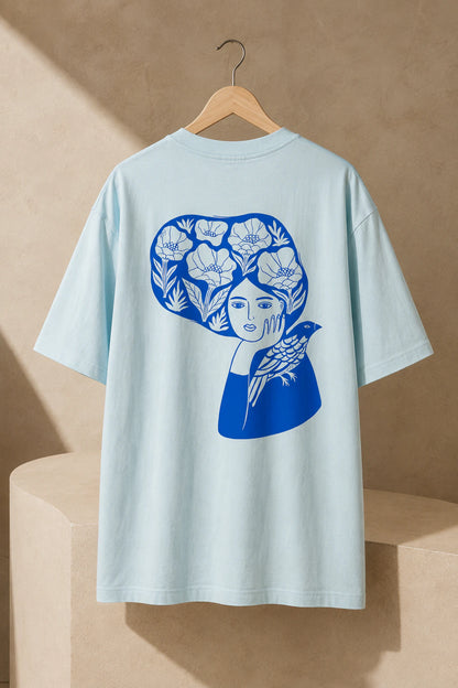 Blue Bird Reverie Oversized Unisex Tee in Sky Blue - back artwork detail