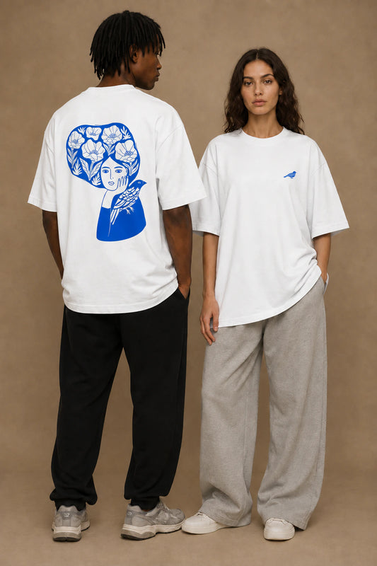 Blue Bird Reverie Oversized Unisex Tee in White - front and back lifestyle view