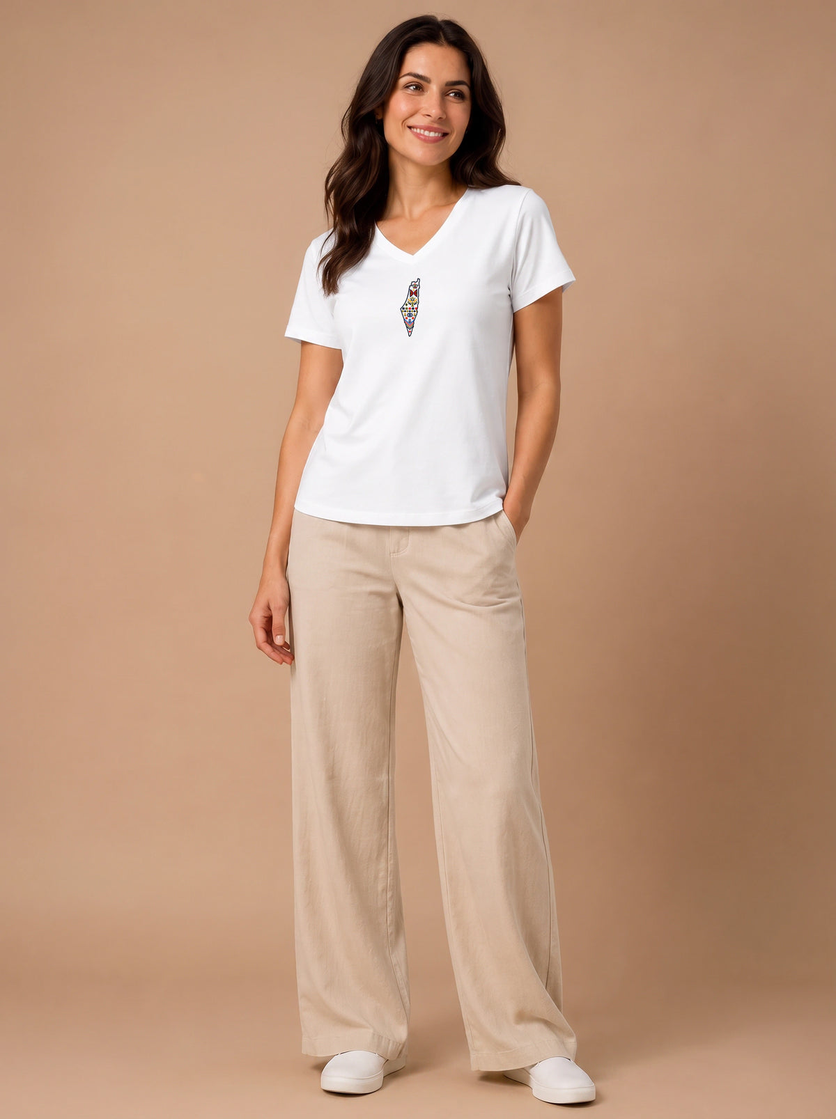 Palestine Heritage Women's Embroidered V-Neck Tee in White - front lifestyle